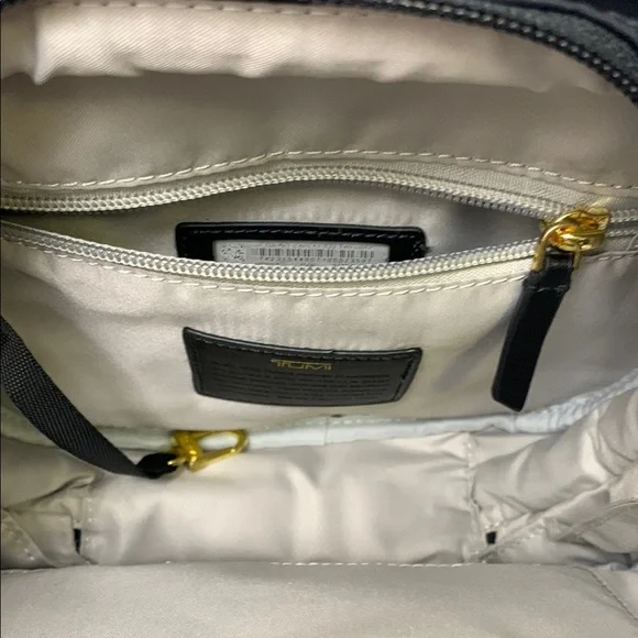 Tumi Black Crossbody Bag with Gold Accents - Picture 2 of 8